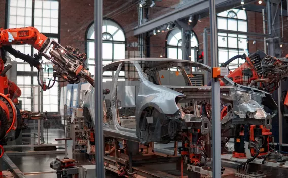 Automated robots assembling a car